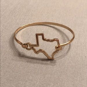 Gold tone Texas shape bracelet